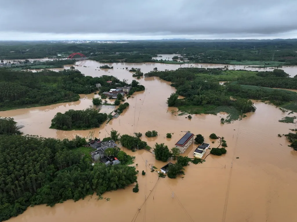(260708) -- QINZHOU, July 8, 2026 (Xinhua) -- An aerial drone photo taken on July 7, 2026 shows a view of Liujia Village in Qinzhou, south China's Guangxi Zhuang Autonomous Region.
The torrential rains caused by Typhoon Maysak have affected 375,000 people across Guangxi and a total of 130,000 people have been evacuated from the affected areas, according to officials at a media conference. (Photo by Ao Shuaichang/Xinhua) (Photo by Ao Shuaichang / Xinhua via AFP)