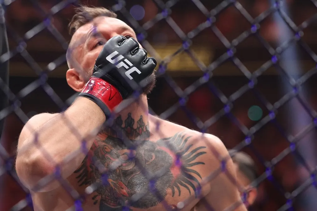 LAS VEGAS, NEVADA - JULY 11: Conor McGregor of Ireland reacts after sustaining a leg injury and losing in the first round of his fight with Max Holloway of the United States in their welterweight bout during UFC 329 at T-Mobile Arena on July 11, 2026 in Las Vegas, Nevada. Ian Maule/Getty Images/AFP (Photo by Ian Maule / GETTY IMAGES NORTH AMERICA / Getty Images via AFP)