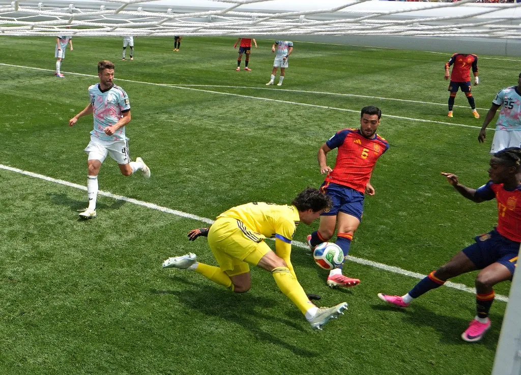 INGLEWOOD, CALIFORNIA - JULY 10: (EDITORS NOTE: Image was captured using a remote camera positioned in the net.) Mikel Merino #6 of Spain scores his team's second goal past Senne Lammens #12 of Belgium during the FIFA World Cup 2026 Quarter Final match between Spain and Belgium at Los Angeles Stadium on July 10, 2026 in Inglewood, California.   David Ramos/Getty Images/AFP (Photo by David Ramos / GETTY IMAGES NORTH AMERICA / Getty Images via AFP)