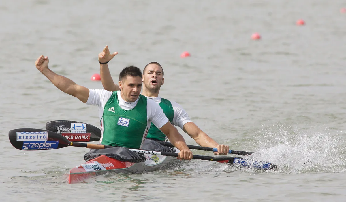 Hungarian K2 racers Zoltan Kammerer and Gabor Kucsera celebrate their victory at the finish line of MOL ICF Flatwater Racing World Cup at Lake Matyer near Szeged, about 170km south of Hungarian capital Budapest on June 7, 2008. AFP PHOTO / STR (Photo by AFP)