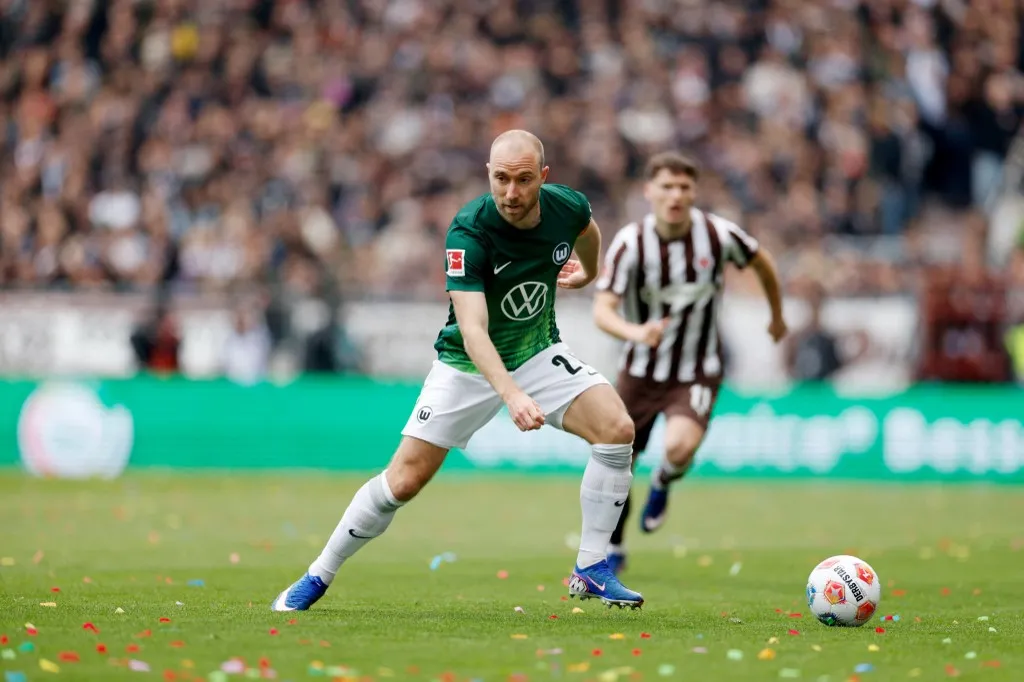16 May 2026, Hamburg: Soccer, Men: Bundesliga, FC St. Pauli - VfL Wolfsburg, Matchday 34, Millerntor Stadium. Christian Eriksen (VfL Wolfsburg) on the ball. IMPORTANT NOTE: In accordance with the regulations of the DFL German Football League and the DFB German Football Association, it is prohibited to use or have used photographs taken in the stadium and/or of the match in the form of sequential images and/or video-like photo series. Photo: Philipp Szyza/dpa (Photo by Philipp Szyza / dpa Picture-Alliance via AFP)