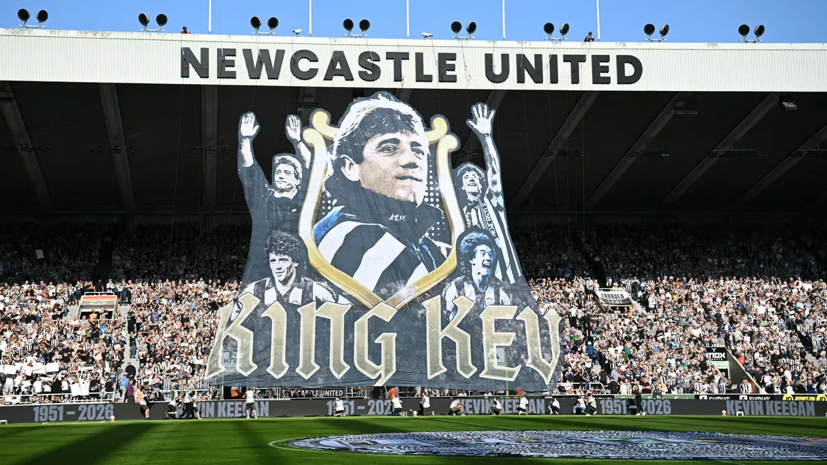 A giant tifo honours their former player and manager Kevin Keegan ahead of the English Premier League football match between Newcastle United and Liverpool at St James' Park in Newcastle-upon-Tyne, north east England on August 23, 2026. Former Liverpool and England star Kevin Keegan died in the summer, aged 75 after battling cancer. He was regarded as one of the greatest players of his generation. (Photo by Paul ELLIS / AFP) / RESTRICTED TO EDITORIAL USE. No use with unauthorized audio, video, data, fixture lists, club/league logos or 'live' services. Online in-match use limited to 120 images. An additional 40 images may be used in extra time. No video emulation. Social media in-match use limited to 120 images. An additional 40 images may be used in extra time. No use in betting publications, games or single club/league/player publications. /
