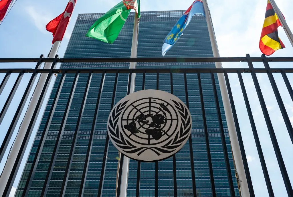 The United Nations logo is seen outside the United Nations Headquarters building in New York City, United States, on August 7, 2026. (Photo by Marcin Golba/NurPhoto) (Photo by Marcin Golba / NurPhoto via AFP)