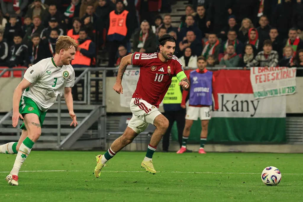 Dominik Szoboszlai of Hungary competes for the ball with Liam Scales of Ireland during the FIFA 2026 World Cup Qualifiers match at Puskas Arena in Budapest, Hungary, on November 16, 2025. (Photo by Pal Gollner/NurPhoto) (Photo by Pál Göllner / NurPhoto via AFP)