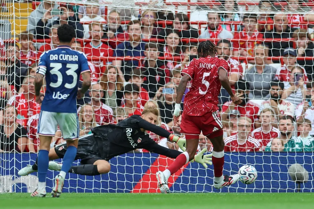 Liverpool's French defender #05 Jeremy Jacquet (R) scores his team's second goal during the pre-season friendly football match between Liverpool and Como at Anfield in Liverpool, north west England on August 16, 2026. (Photo by Darren Staples / AFP)
