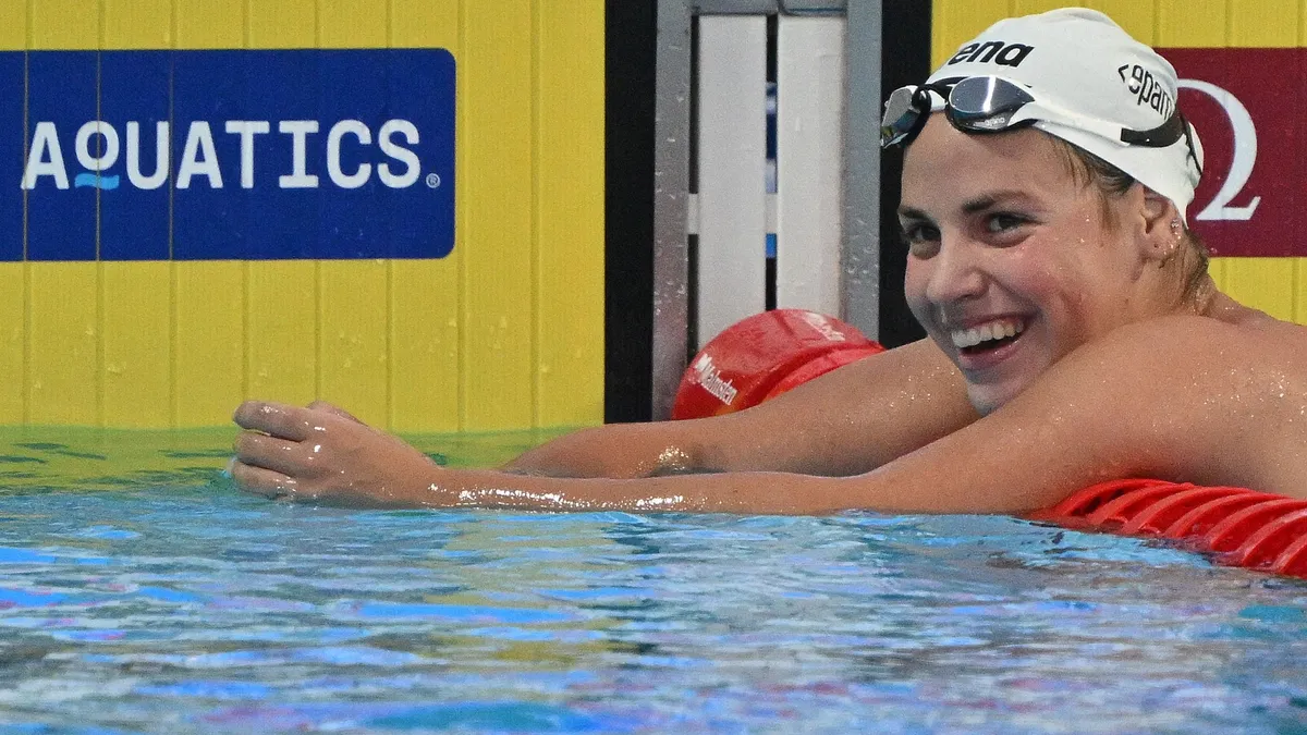 Hungary's Vivien Jackl celebrates placing first in the Swimming Women's 1500m Freestyle Final during the LEN European Aquatics Championships, at the Milan Gale Muskatirovic sports centre in Belgrade, on June 21, 2024. (Photo by ANDREJ ISAKOVIC / AFP) / The erroneous mention[s] appearing in the metadata of this photo by ANDREJ ISAKOVIC has been modified in AFP systems in the following manner: [Vivien Jackl] instead of [Vicien Jackl]. Please immediately remove the erroneous mention[s] from all your online services and delete it (them) from your servers. If you have been authorized by AFP to distribute it (them) to third parties, please ensure that the same actions are carried out by them. Failure to promptly comply with these instructions will entail liability on your part for any continued or post notification usage. Therefore we thank you very much for all your attention and prompt action. We are sorry for the inconvenience this notification may cause and remain at your disposal for any further information you may require.