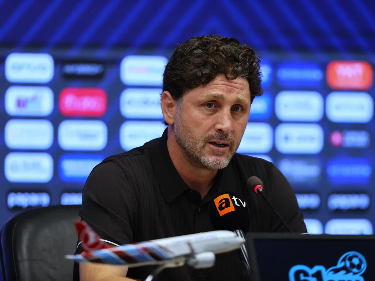 TRABZON, TURKIYE - AUGUST 20: Trabzonspor head coach Fatih Tekke speaks after the UEFA Europa League playoff round first-leg match between Trabzonspor and Ferencvaros at Papara Park in Trabzon, Turkiye on August 20, 2026. Hasan Tascan / Anadolu (Photo by Hasan Tascan / Anadolu via AFP)