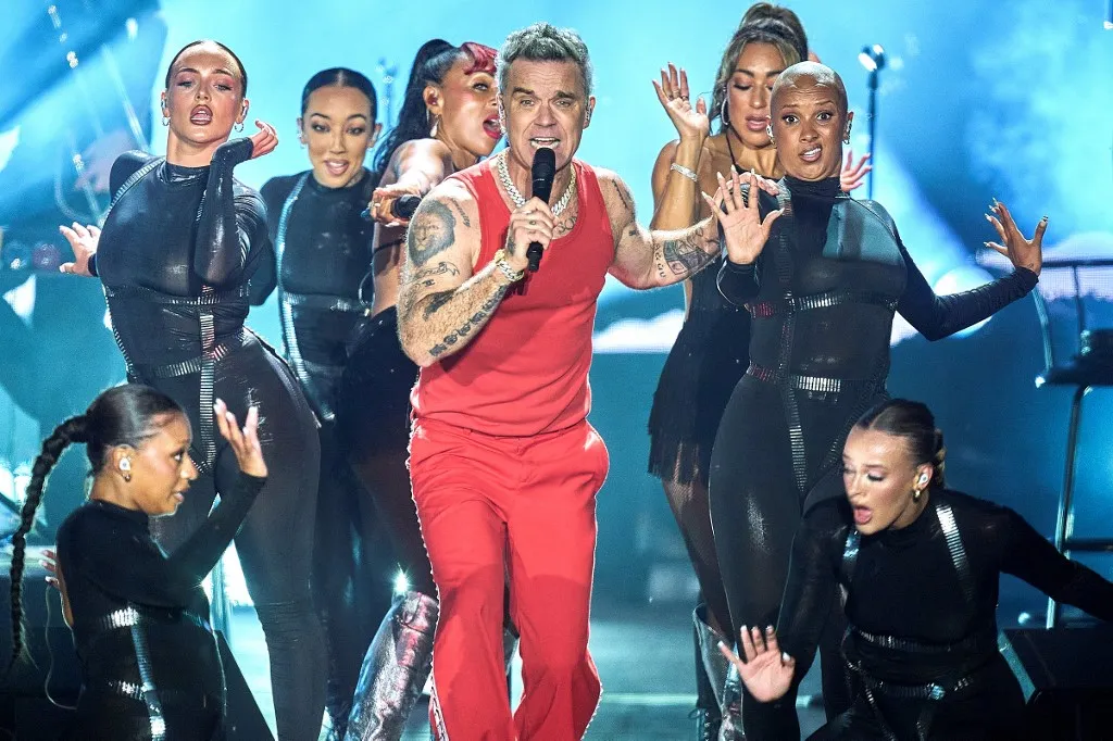 British singer Robbie Williams performs on stage at Smukfest music festival in Skanderborg, Denmark, on August 5, 2026. (Photo by Mikkel Berg Pedersen / Ritzau Scanpix / AFP) / Denmark OUT