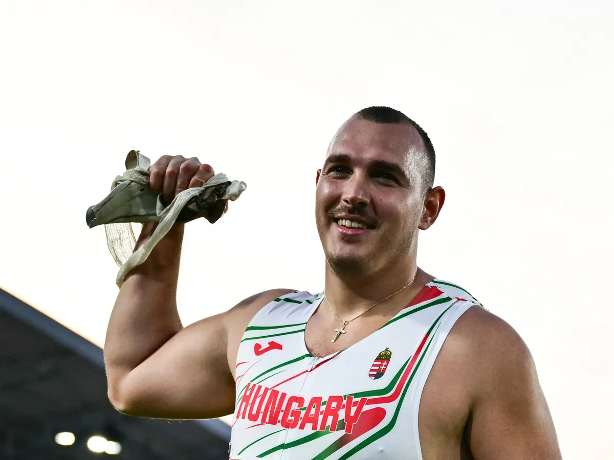 Gold medallist Hungary's Bence Halasz celebrates after winning the men's hammer throw final during the European Athletics Championships at Alexander Stadium in Birmingham on August 11, 2026. (Photo by Ben STANSALL / AFP)