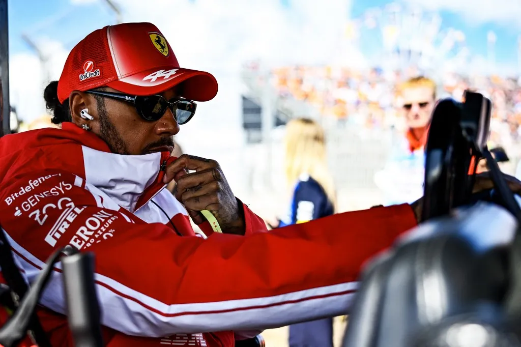 Lewis Hamilton, #44, of the Scuderia Ferrari HP team, in the Ferrari SF-25, faces the press during the drivers' parade at the FIA Formula One World Championship GP Formula F1 Heineken Dutch Grand Prix in Zandvoort, Netherlands, on August 23, 2026. (Photo by Luca Barsali/NurPhoto) (Photo by Luca Barsali / NurPhoto via AFP)