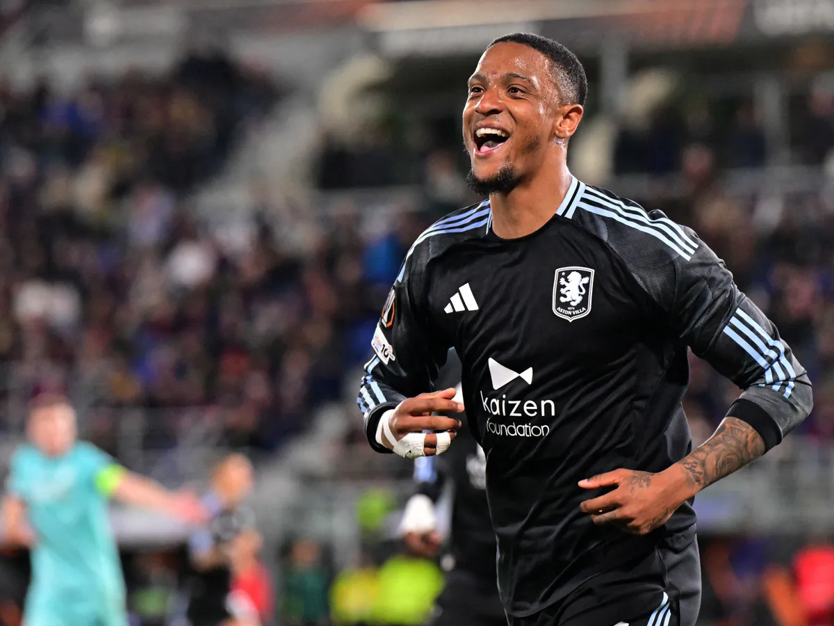 Aston Villa's English defender #04 Ezri Konsa celebrates scoring his team's first goal during the UEFA Europa League quarter final first leg football match between Bologna and Aston Villa at the Renato Dall'Ara stadium in Bologna on April 9, 2026. (Photo by Stefano RELLANDINI / AFP)