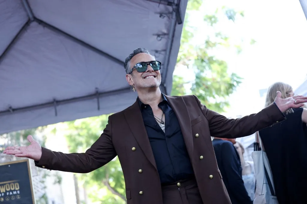 Irish musician Vivian Campbell of Def Leppard attends the English rock bands Hollywood Walk of Fame star ceremony in front of Capitol Records Building in Los Angeles, California, on October 9, 2025. (Photo by VALERIE MACON / AFP)