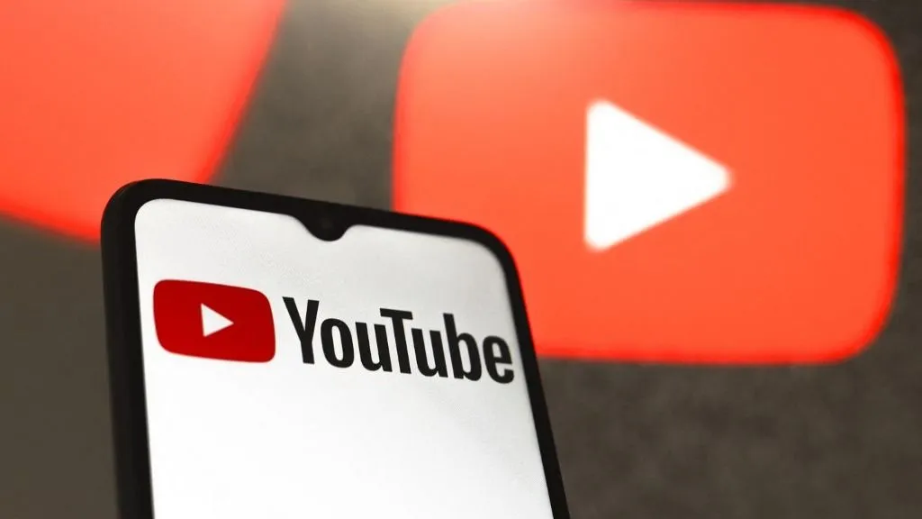 The YouTube logo appears on the screen of a smartphone in Reno, United States, on December 13, 2024. (Photo Illustration by Jaque Silva/NurPhoto) (Photo by Jaque Silva / NurPhoto via AFP)