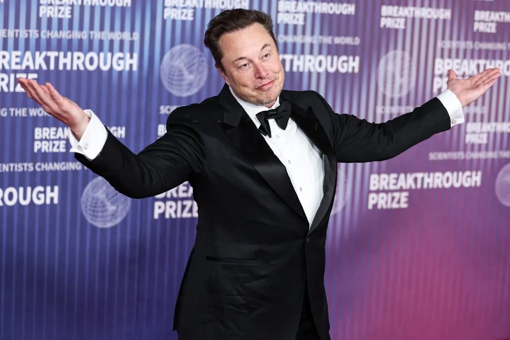 (FILE) Elon Musk Becomes World's First Trillionaire After SpaceX Goes Public on June 12, 2026. MIRACLE MILE, LOS ANGELES, CALIFORNIA, USA - APRIL 13: Chief Executive Officer (CEO) and product architect of Tesla, Inc., Founder, CEO and chief engineer of SpaceX, Owner, Chief Technology Officer (CTO) and executive chairman of X Corp. (formerly Twitter) Elon Reeve Musk arrives at the 10th Annual Breakthrough Prize Ceremony held at the Academy Museum of Motion Pictures on April 13, 2024 in Miracle Mile, Los Angeles, California, United States. (Photo by Xavier Collin/Image Press Agency/NurPhoto) (Photo by Image Press Agency / NurPhoto via AFP)
