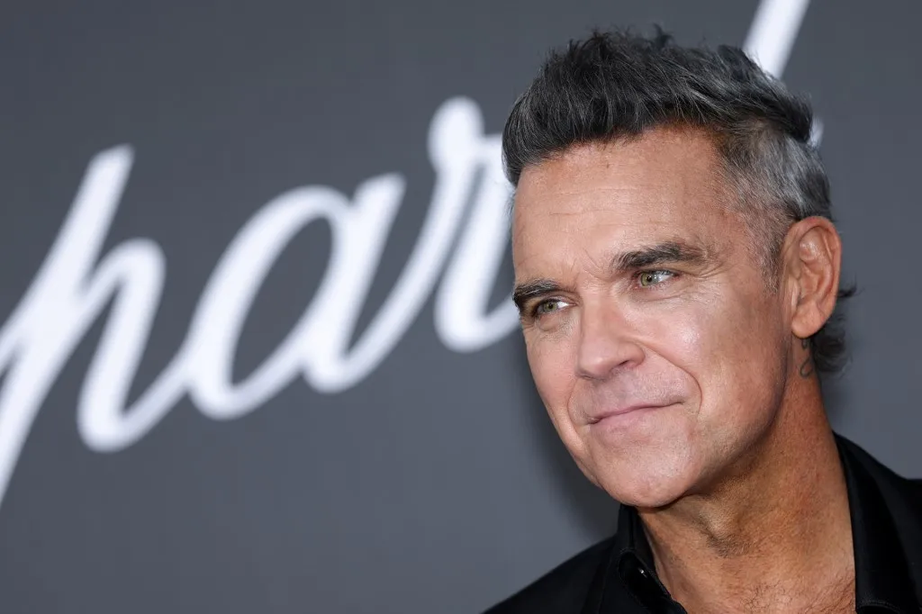 British singer-Songwriter Robbie Williams attends the annual American Foundation for AIDS Research amfAR Gala Cannes 2026 at the Hotel du Cap-Eden-Roc in Cap d'Antibes, southern France, on the sidelines of the 79th edition of the Cannes Film Festival on May 21, 2026. (Photo by Julie SEBADELHA / AFP)