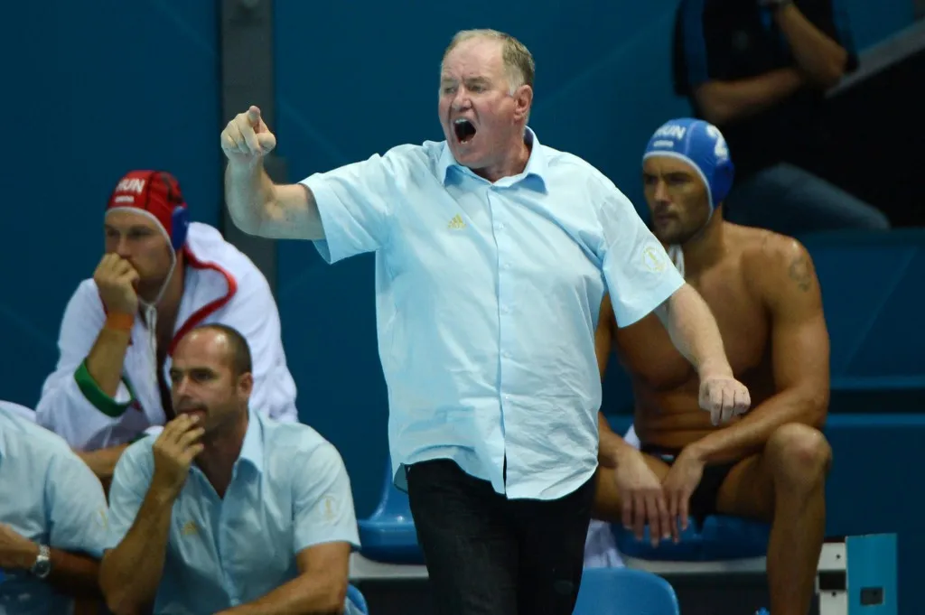 Hungarys head coach Denes Kemeny reacts during the mens water polo preliminary match between Romania and Hungary of the London 2012 Olympic Games on August 2, 2012 in London. AFP PHOTO / KHALED DESOUKI (Photo by KHALED DESOUKI / AFP)
