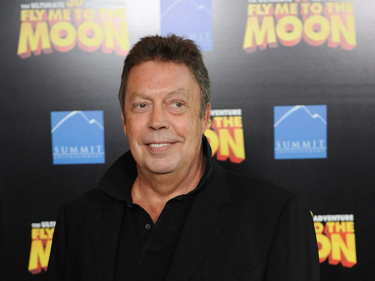 Actor Tim Curry arrives for the Los Angeles premiere of the 3-D animated feature "Fly Me To The Moon," in Los Angeles, California on Aug 03, 2008. AFP PHOTO / Robyn Beck (Photo by ROBYN BECK / AFP)