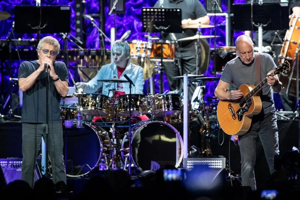 Roger Daltrey (L) and Pete Townshend of British rock band "The Who" performs at the Toyota Center on the second leg of their Moving On! tour on September 25, 2019 in Houston, Texas. (Photo by SUZANNE CORDEIRO / AFP)