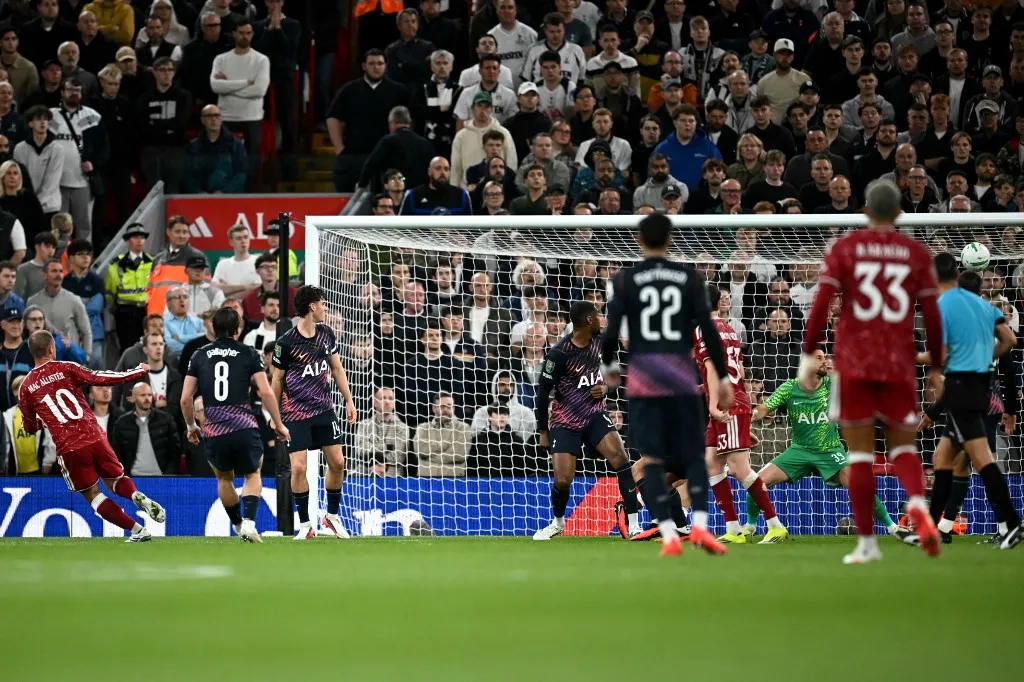 Liverpool's Argentinian midfielder #10 Alexis Mac Allister celebrates scoring the team's first goal during the English League Cup third round football match between Liverpool and Tottenham Hotspur at Anfield stadium in Liverpool, north west England on September 15, 2026. (Photo by Paul ELLIS / AFP) / RESTRICTED TO EDITORIAL USE. No use with unauthorized audio, video, data, fixture lists, club/league logos or 'live' services. Online in-match use limited to 120 images. An additional 40 images may be used in extra time. No video emulation. Social media in-match use limited to 120 images. An additional 40 images may be used in extra time. No use in betting publications, games or single club/league/player publications. / 