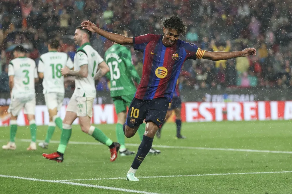 Barcelona's Spanish forward #10 Lamine Yamal celebrates scoring his team's seventh goal during the Spanish league football match between FC Barcelona and Racing Santander at the Camp Nou stadium in Barcelona on September 16, 2026. (Photo by Lluis GENE / AFP)