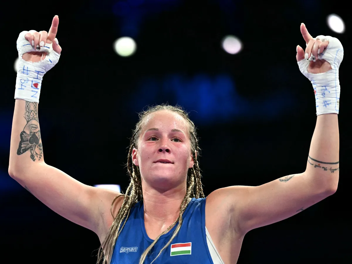 Hungary's Anna Luca Hamori celebrates after winning against Ireland's Grainne Walsh in the women's 66kg preliminaries round of 32 boxing match during the Paris 2024 Olympic Games at the North Paris Arena, in Villepinte on July 28, 2024. (Photo by MOHD RASFAN / AFP)