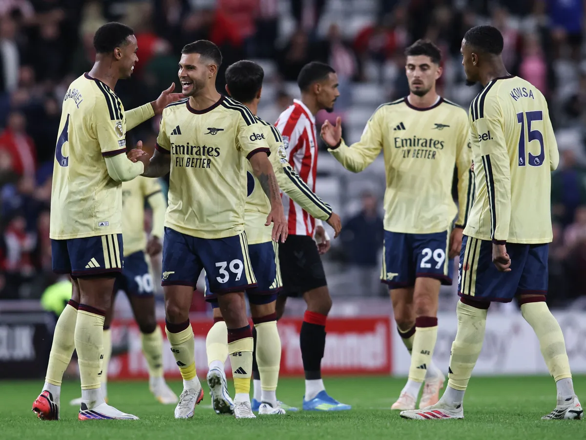 Arsenal players celebrate at full time during the Premier League match between Sunderland and Arsenal at the Stadium of Light in Sunderland, on September 12, 2026. (Photo by Michael Driver/MI News/NurPhoto) (Photo by MI News / NurPhoto via AFP)