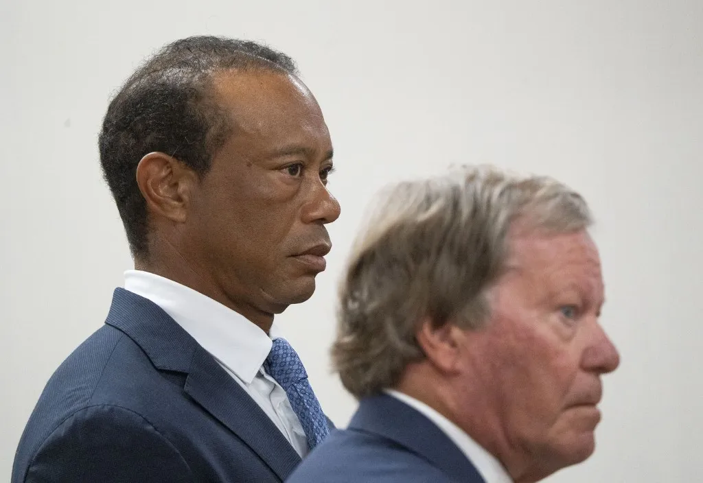 STUART, FLORIDA - SEPTEMBER 2: Tiger Woods (L) appears during a plea hearing at Martin County Courthouse on September 2, 2026 in Stuart, Florida. Tiger Woods is expected to change his plea in the case over a DUI crash that occurred on March 27, 2026, on Jupiter Island in Martin County. Crystal Vander Weit-Pool/Getty Images/AFP (Photo by POOL / GETTY IMAGES NORTH AMERICA / Getty Images via AFP)