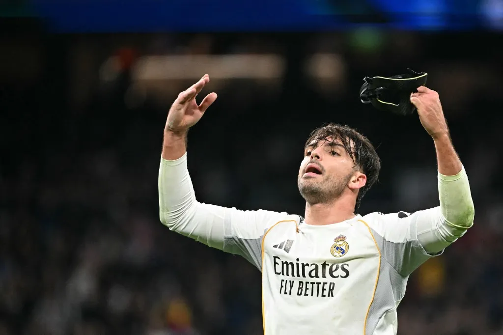 Real Madrid's Spanish defender #17 Raul Asencio celebrates scoring his team's second goal during the Spanish league football match between Real Madrid CF and Levante UD at Santiago Bernabeu Stadium in Madrid on January 17, 2026. (Photo by Javier SORIANO / AFP)