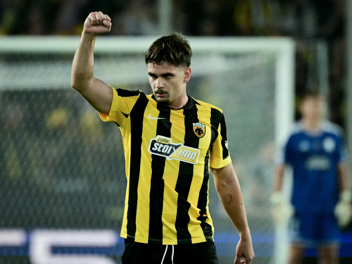 AEK Athens' Romanian midfielder #18 Razvan Marin celebrates scoring his team's first goal during the UEFA Champions League - League phase, Matchday 1 - football match between AEK Athens and LASK at Agia Sophia Stadium in Athens on September 08, 2026. (Photo by Angelos Tzortzinis / AFP)