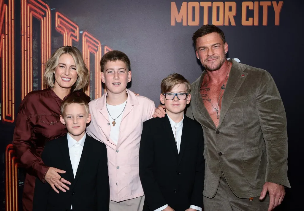 NEW YORK, NEW YORK - JULY 13: Catherine Ritchson and Alan Ritchson pose with their children at the premiere of "Motor City" at Museum of Modern Art on July 13, 2026 in New York City.   Dimitrios Kambouris/Getty Images/AFP (Photo by Dimitrios Kambouris / GETTY IMAGES NORTH AMERICA / Getty Images via AFP)