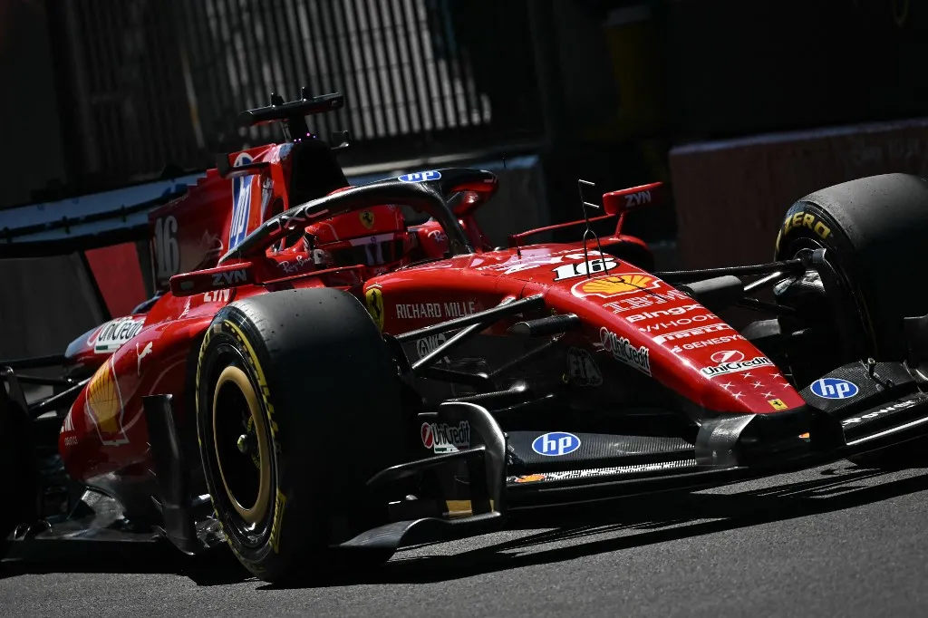 Ferrari's Monegasque driver Charles Leclerc drives on the pit lane during the first practice session of the Italian Formula One Grand Prix at the Autodromo Nazionale Monza circuit in Monza, northern Italy on September 4, 2026. (Photo by Marco BERTORELLO / AFP)