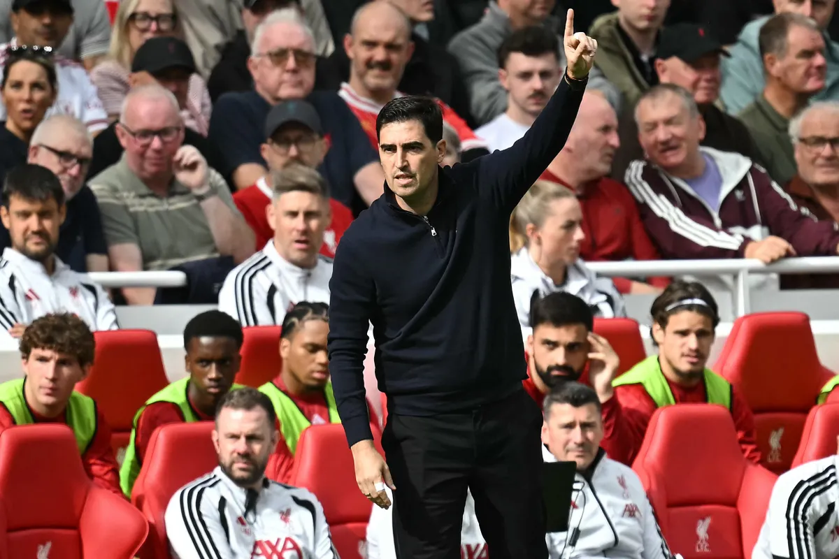 Liverpool's Spanish head coach Andoni Iraola reacts during the English Premier League football match between Liverpool and Fulham at Anfield in Liverpool, north west England on September 12, 2026. (Photo by Paul ELLIS / AFP) / RESTRICTED TO EDITORIAL USE. No use with unauthorized audio, video, data, fixture lists, club/league logos or 'live' services. Online in-match use limited to 120 images. An additional 40 images may be used in extra time. No video emulation. Social media in-match use limited to 120 images. An additional 40 images may be used in extra time. No use in betting publications, games or single club/league/player publications. / 