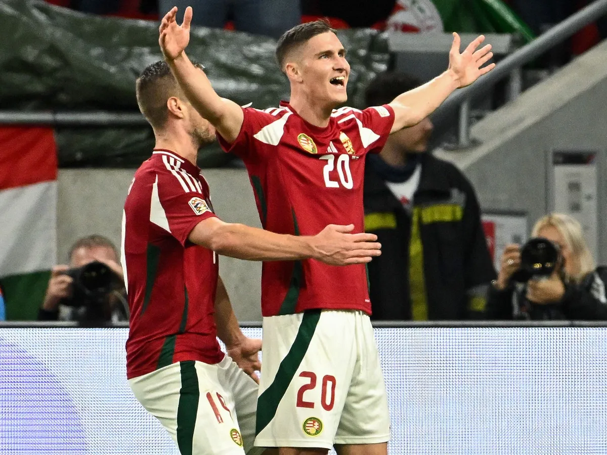 Hungary's forward #20 Roland Sallai celebrates scoring the opening goal with his teammates during the UEFA Nations League, League A Group A3 football match Hungary vs the Netherlands, at the Puskas Arena in Budapest on October 11, 2024. (Photo by Attila KISBENEDEK / AFP)