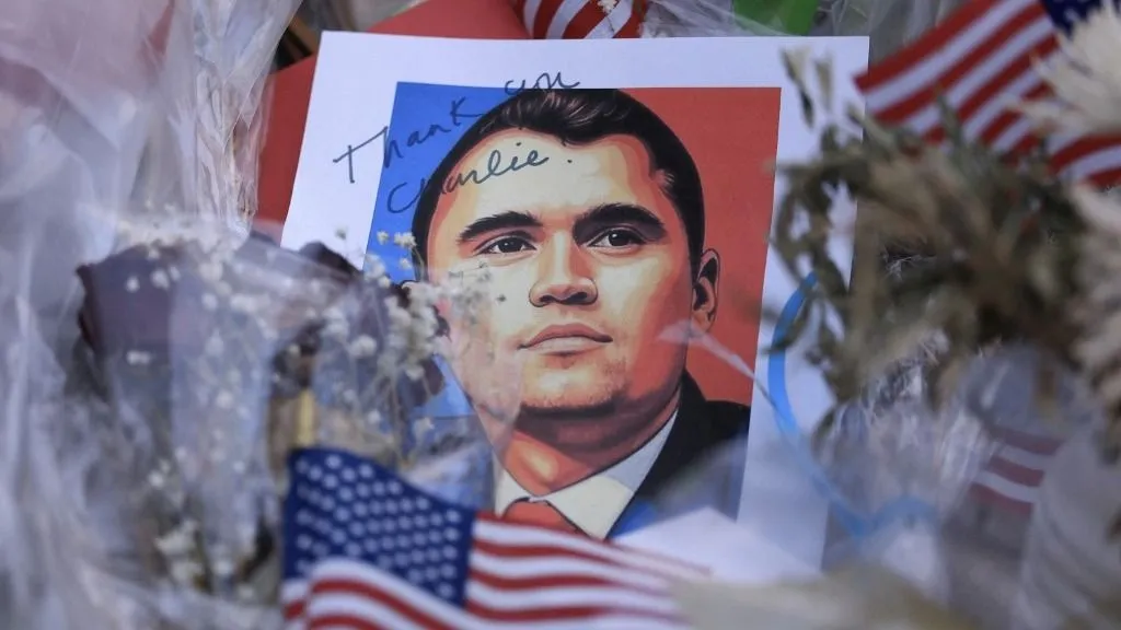 PHOENIX, ARIZONA - SEPTEMBER 18: Items are displayed in the makeshift memorial for Charlie Kirk outside the headquarters of Turning Point USA on September 18, 2025, in Phoenix, Arizona. Kirk, the CEO and co-founder of Turning Point USA, was shot and killed on September 10th while speaking at an event for his "American Comeback Tour" at Utah Valley University. Joe Raedle/Getty Images/AFP (Photo by JOE RAEDLE / GETTY IMAGES NORTH AMERICA / Getty Images via AFP)