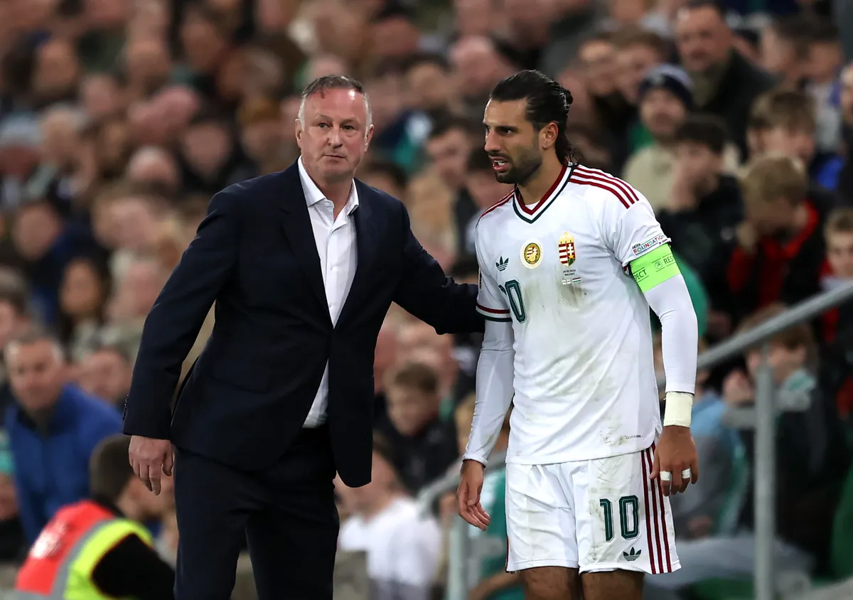 Northern Ireland manager Michael O'Neill and Hungary's Dominik Szoboszlai on the touchline during the UEFA Nations League, league phase, group B2 match at the Clearer Twist National Stadium at Windsor Park, Belfast. Picture date: Monday September 28, 2026.