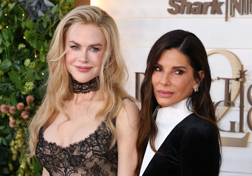 Nicole Kidman wearing Atelier Versace, styled by Jason Bolden and Sandra Bullock wearing custom Louis Vuitton, styled by Leslie Fremar arrive at the Los Angeles Premiere Of Warner Bros. Pictures' 'Practical Magic 2' held at the Directors Village (formerly Westwood Village Theatre) on August 31, 2026 in Westwood, Los Angeles, California, United States. (Photo by Image Press Agency/NurPhoto) (Photo by Image Press Agency / NurPhoto via AFP)
