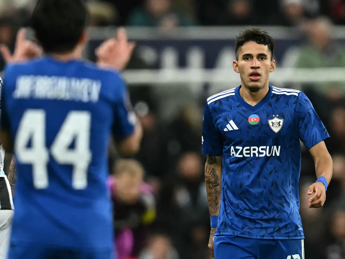 Qarabag's Colombian forward #17 Camilo Duran reacts after scoring their first goal during the UEFA Champion's League knockout round play-off, 2nd leg football match between Newcastle United and Qarabag at St James' Park in Newcastle-upon-Tyne, north east England on February 24, 2026. (Photo by Paul ELLIS / AFP)