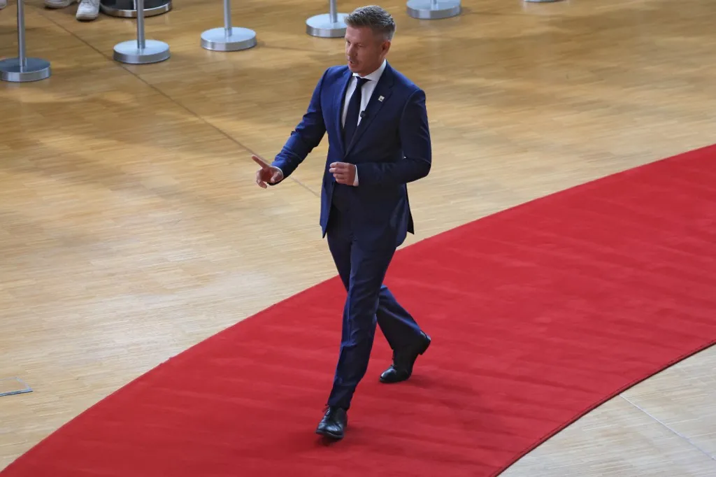 Hungary's Prime Minister Peter Magyar arrives for a European Union summit at the EU headquarters in Brussels on October 15, 2026. EU leaders head on October 15, 2026 for their biggest clash yet over the bloc's next long-term budget, as they race to lock in a deal before next year's French presidential election. (Photo by Ludovic MARIN / AFP)