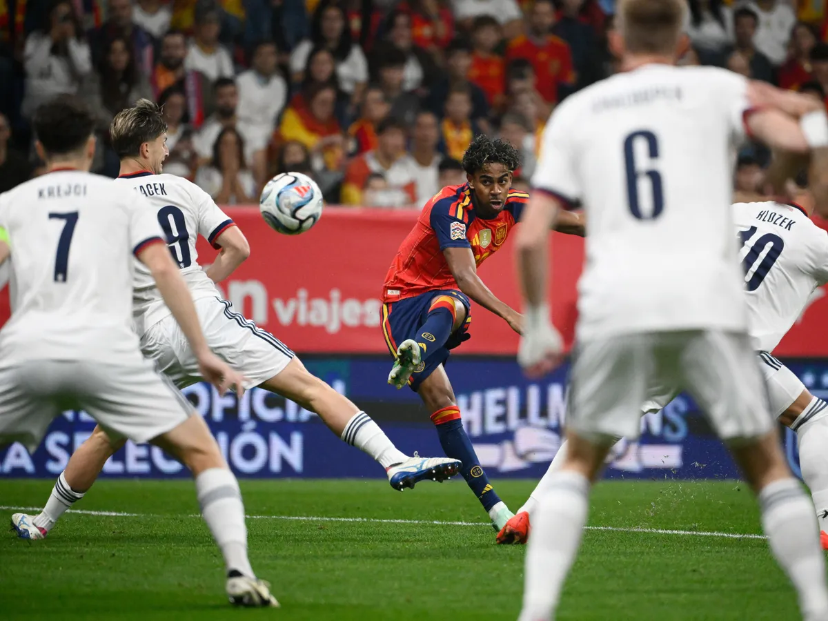 Spain's forward #19 Lamine Yamal scores the opening goal during the UEFA Nations League Group A3 football match between Spain and the Czech Republic at the Carlos Tartiere Stadium in Oviedo on October 3, 2026 (Photo by Miguel RIOPA / AFP)