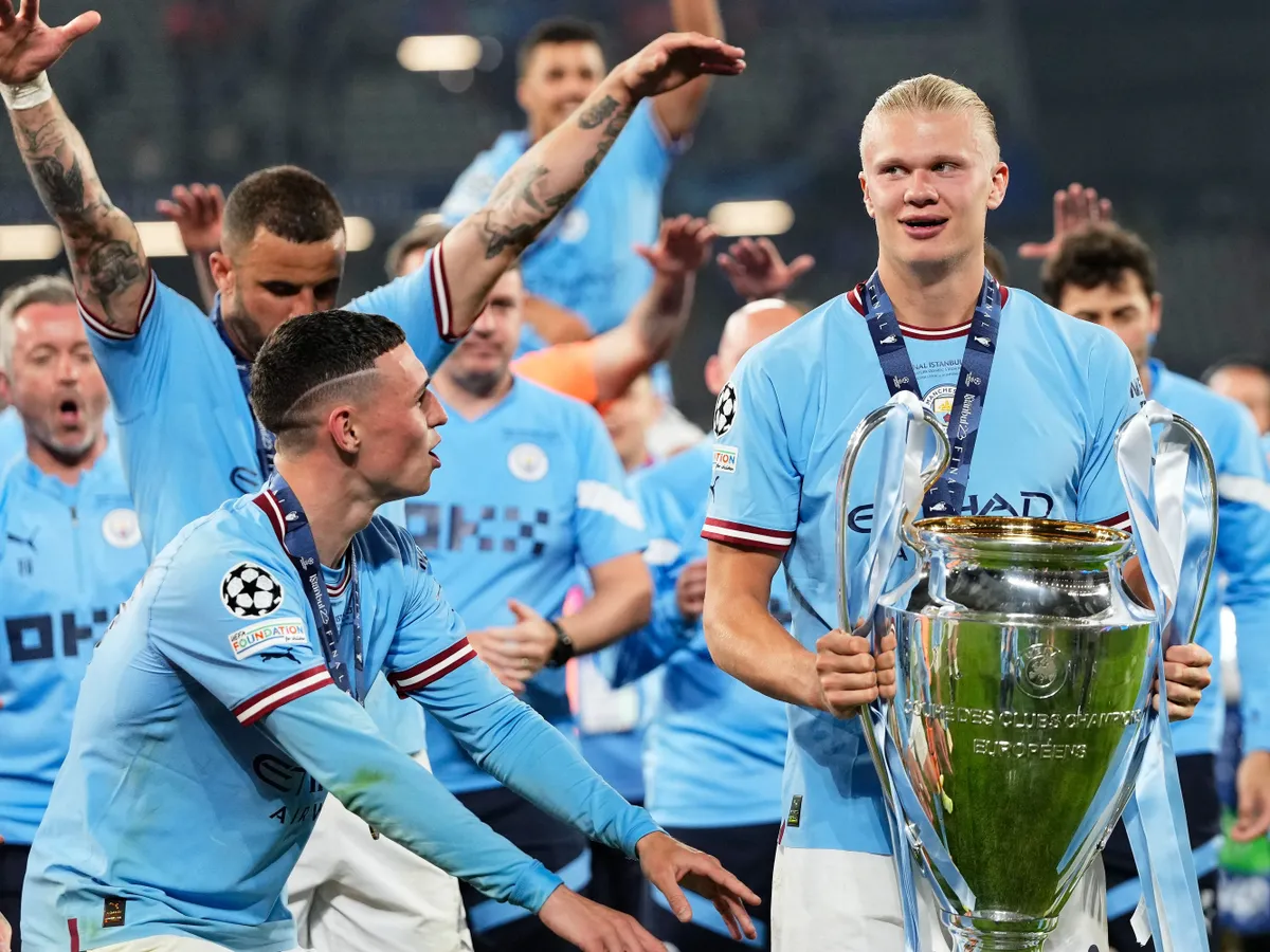Erling Haaland centre-forward of Manchester City and Norway celebrates with the European Cup trophy after winning the UEFA Champions League 2022/23 final match between FC Internazionale and Manchester City FC at Atatuerk Olympic Stadium on June 10, 2023 in Istanbul, Turkey. (Photo by Jose Breton/Pics Action/NurPhoto) (Photo by Jose Breton / NurPhoto via AFP)
