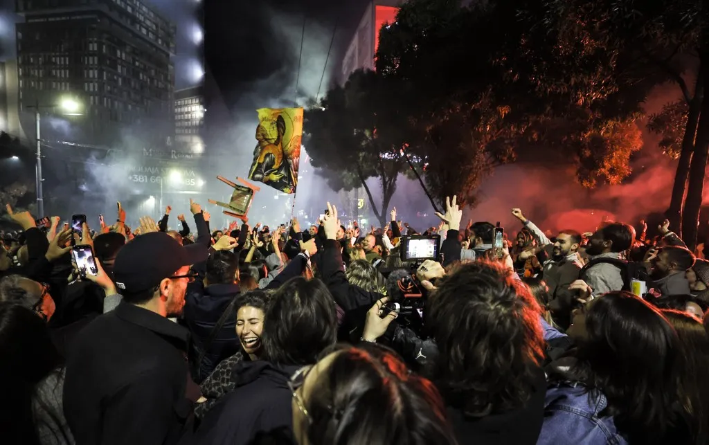 BELGRADE, SERBIA - OCTOBER, 26 : People celebrate after Aleksandar Vucic, leader of the Serbian Progressive Party (SNS) conceded defeat in the parliamentary election in Belgrade, Serbia October 26, 2026. Samir Jordamovic / Anadolu (Photo by Samir Jordamovic / Anadolu via AFP)